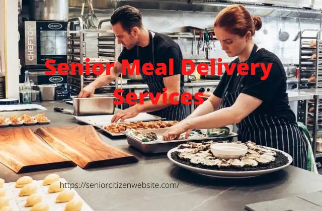 2 people preparing meals for seniors in a professional kitchen.